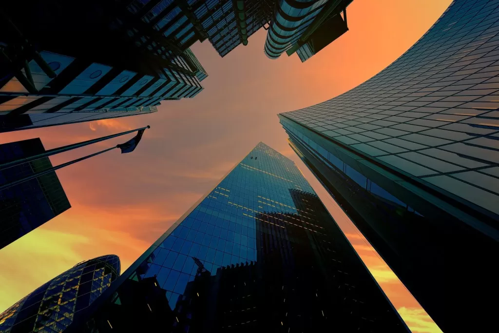 Low angle photo of London skyscrapers at dusk